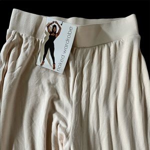 Naked Wardrobe cream smooth flare PANTS- NEW! L